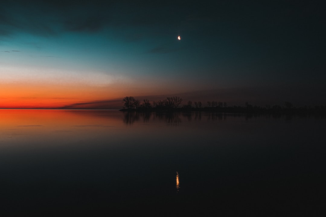 Photo Moonlight, sunrise